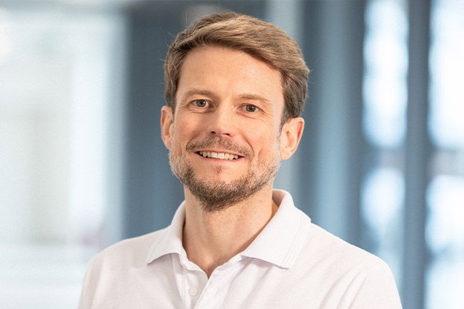 Dr. Christophe Huber